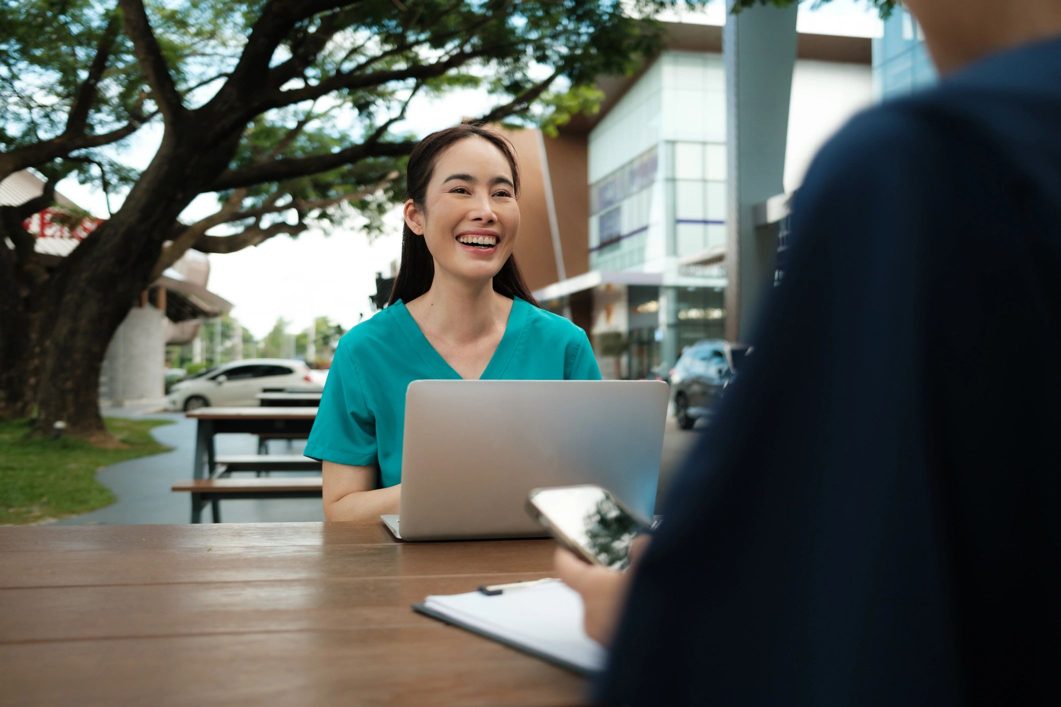 Professional healthcare consultant smiling during a consultation